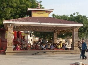 Yoga asan group act at Assi ghat Varanasi best scaled